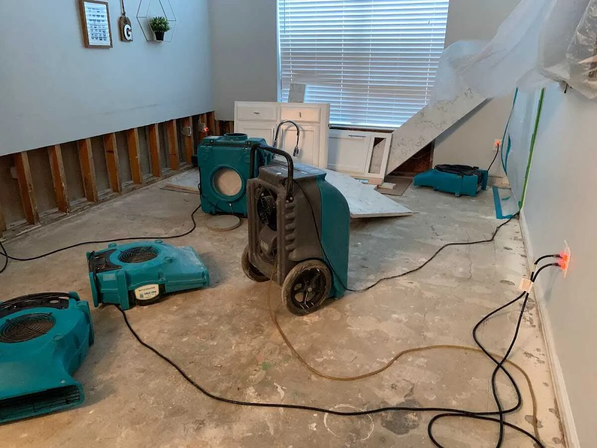 Dehumidifier in flood-cut room for Water Damage Restoration in Triana